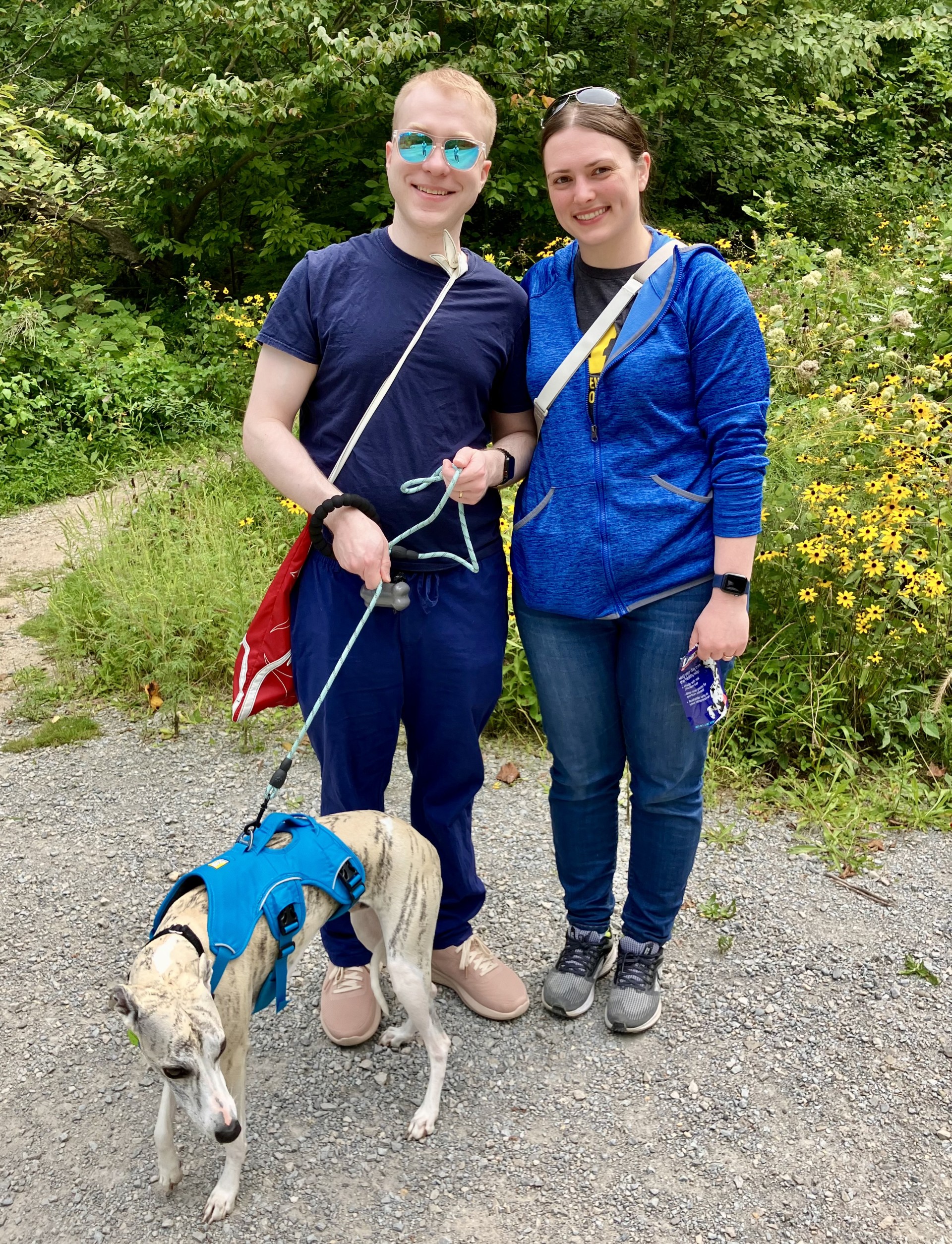 Sara her husband, Stephen and dog, Yoshi walking on one of many trails in Ann Arbor.